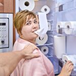 Husband Catches Wife Eating Toilet Paper by Refrigerator in Late-Night Snack Attack: A Tale of Absurdity